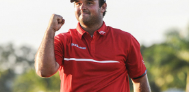 Red-clad Reed captures WGC-Cadillac