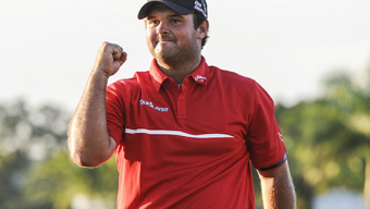 Red-clad Reed captures WGC-Cadillac