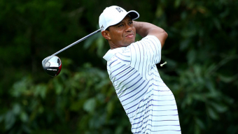 Tiger says he will miss month or two