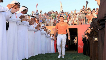 Fowler charges to Abu Dhabi title