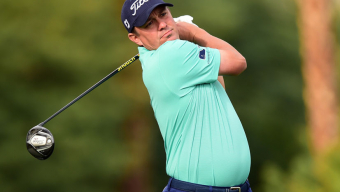 Dufner survives playoff for win