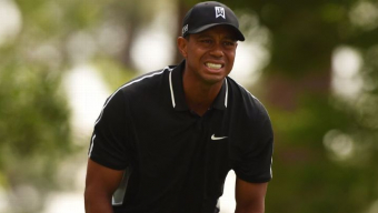 Back spasms for Tiger; withdraws