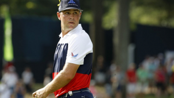 Woodland cards a cool 64 to lead PGA