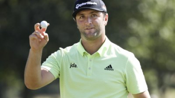 Rahm holds off rookie for AmEx title