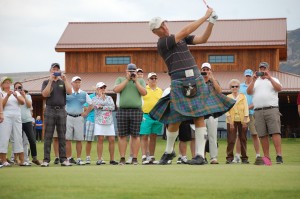 Course designer David Kidd, dressed in his fashionable Scottish kilt, had the honor of hitting the first official drive