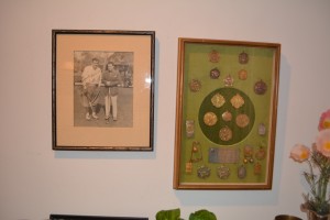 A picture of Little with his famous contemporary Babe Ruth hangs next to his 'Little Slam' medals